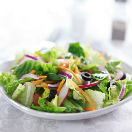 garden salad on white table cloth