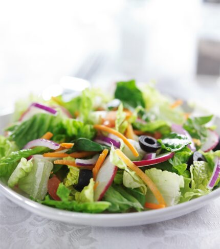 garden salad on white table cloth