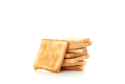 Stack of slices of bread toasts isolated on white background